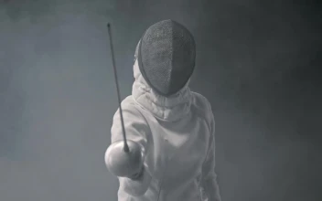 Video Stock Portrait Of A Fencer Who Waves His Sword Free