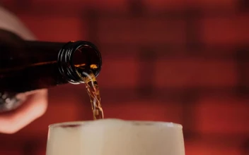 Video Stock Pouring Beer Into A Glass While The Foam Overflows Free