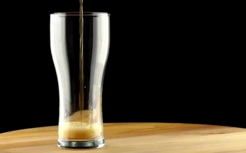 Video Stock Pouring Beer On A Glass And Foam Spilling Free