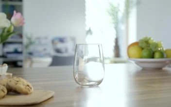 Video Stock Pouring Chocolate Milk Into A Glass On The Table Free