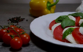 Video Stock Pouring Oil Over A Tomato Salad Free