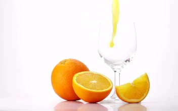 Video Stock Pouring Orange Juice Into A Glass White Background Free