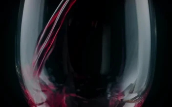 Video Stock Pouring Red Wine In A Glass Seen On A Black Free