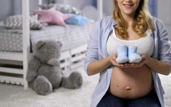 Video Stock Pregnant Woman Holding Baby Shoes Free