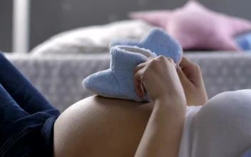 Video Stock Pregnant Woman Playing With Baby Shoes Free