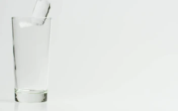 Video Stock Preparing A Drink With Ice Limes And Mineral Water Free