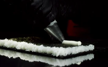 Video Stock Preparing A Roll Of Sushi Free