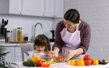 Video Stock Preparing Salad With Her Daughter Free