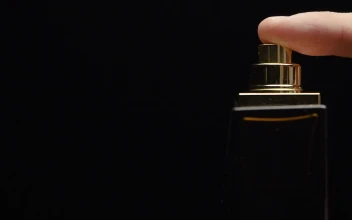 Video Stock Pressing Down On A Bottle Of Perfume Free
