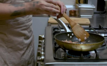 Video Stock Professional Cook Frying Bacon In A Frying Pan Free