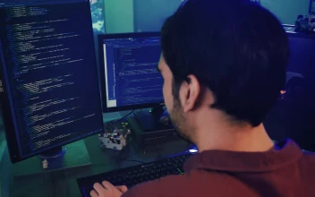 Video Stock Professional Programmer Working On A Big Computer Free