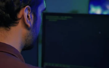 Video Stock Professional Programmer Working On A Large Computer Free