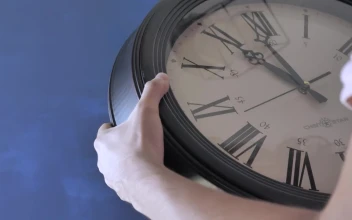 Video Stock Putting On A Wall Clock Free
