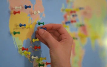 Video Stock Putting Thumbtacks On A World Map Board Free