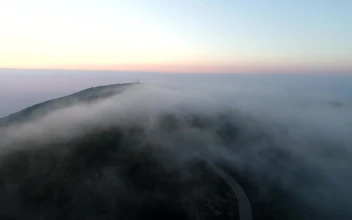 Video Stock Reaching The Top Of A Mountain Road Free