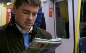 Video Stock Reading A Newspaper On The Train Free