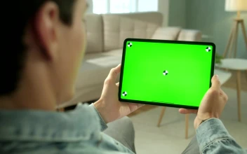 Video Stock Rear View Of Green Screen Tablet Swipe In Living Room Free