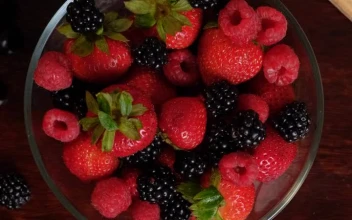 Video Stock Red Berries Served In A Bowl On A Wooden Table Free