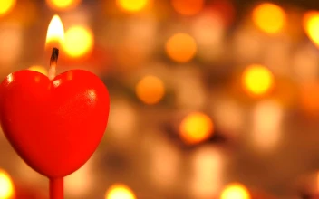 Video Stock Red Heart Shaped Candle With More Candles Behind Free