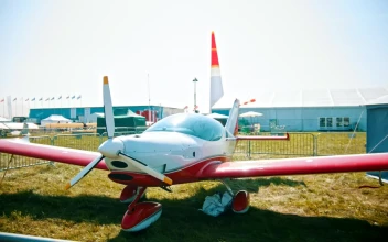 Video Stock Red Plane Parked On A Display In A Field Free