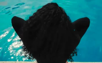 Free Stock Video Sitting By The Edge Of The Swimming Pool