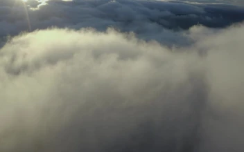 Free Stock Video Relief Covered By Clouds Of Mist During Sunset