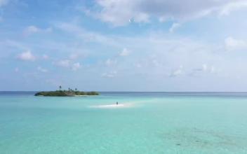 Free Stock Video Remote Tropical Island With A Couple On A Sandbar