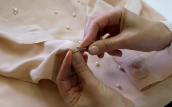 Free Stock Video Removing A Button Before Cleaning