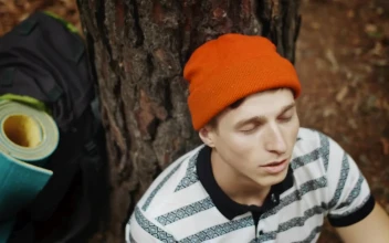 Free Stock Video Resting Hiker Thinking With Eyes Closed Looks Up In Wonder