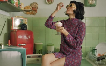 Free Stock Video Retro Woman Eating An Ice Cream In The Kitchen