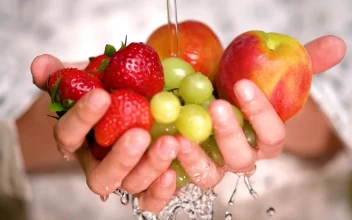 Free Stock Video Rinsing Strawberries Apples And Grapes Holding Hands