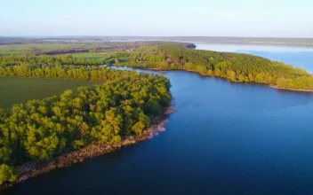 Free Stock Video River Near Farm Fields Aerial Shot
