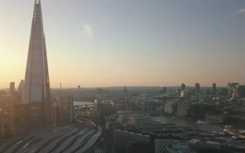 Free Stock Video River Of London Through The Buildings Aerial Shot