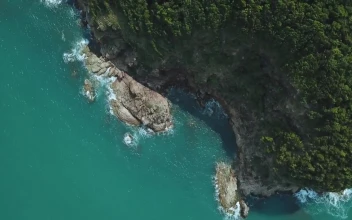 Free Stock Video Rocky Peninsula During A Sunny Day Seen From Above