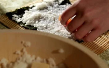Free Stock Video Rolling A Sushi Roll Filled With Salmon