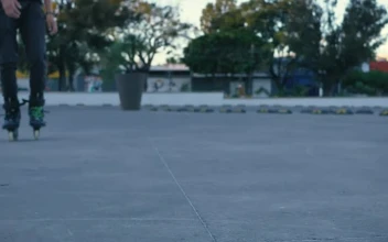 Free Stock Video Rolling On Roller Skates On The Ground Of A Parking