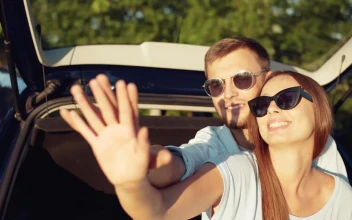Free Stock Video Romantic Couple Sit In Back Of Car Holding Hands