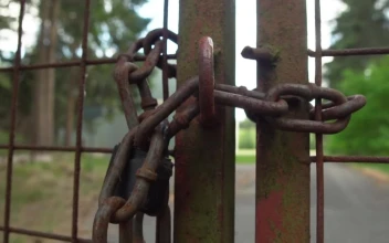 Free Stock Video Rusty Fence With A Chain Of A Property In Nature