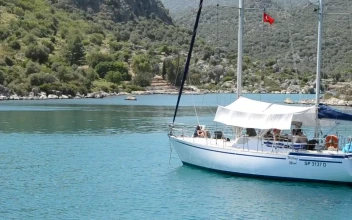 Free Stock Video Sailboat Anchored In A Small Bay
