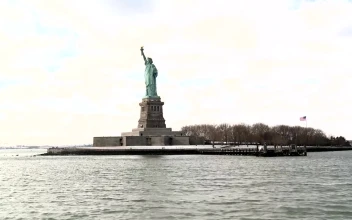 Free Stock Video Sailing By The Statue Of Liberty In A Cloudy Day