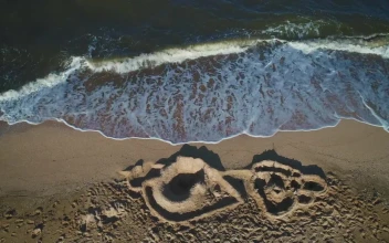 Free Stock Video Sand Castle Next To The Waves Of The Sea