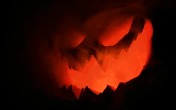 Free Stock Video Scary Halloween Pumpkin Lit Up In The Dark