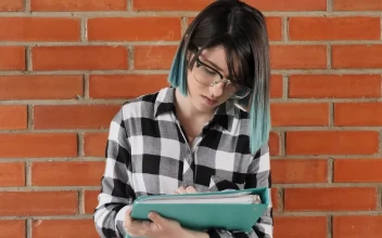 Free Stock Video Schoolboy Girl In Her School Studying Concentrated