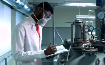 Free Stock Video Scientist In Facemask Writing In A Chemical Lab