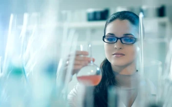Free Stock Video Scientist Looks At A Liquid In A Conical Flask
