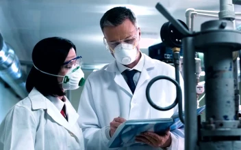 Free Stock Video Scientist Taking Notes From Lab Equipment