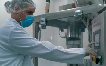 Free Stock Video Scientist Wearing Masks And Gloves In A Laboratory