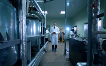Free Stock Video Scientist Walking Through Laboratory