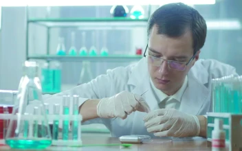 Free Stock Video Scientist Working With White Powder In The Lab