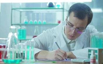 Free Stock Video Scientist Writing In The Lab